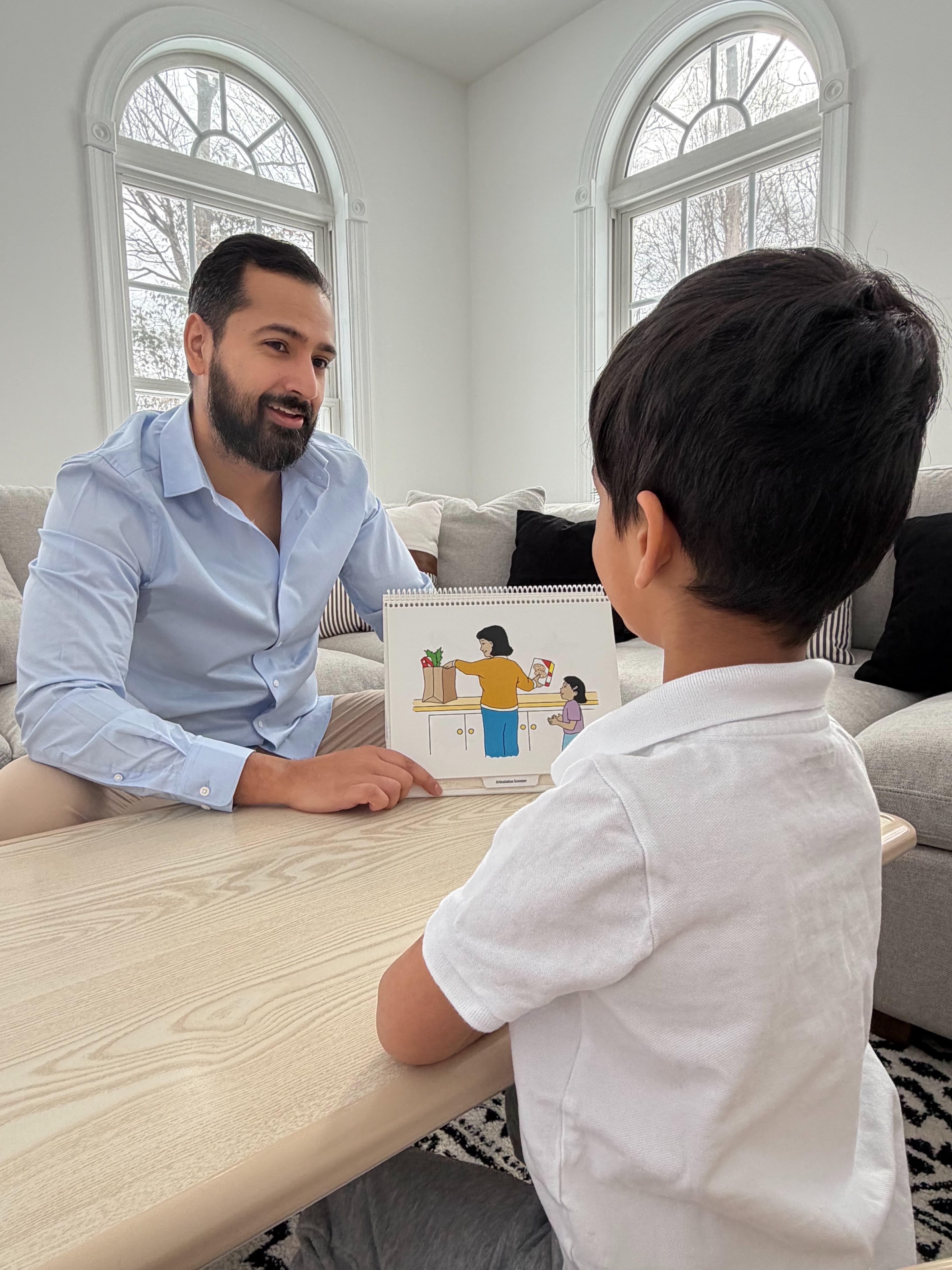 Pulkit Arora conducting a speech therapy session with a child